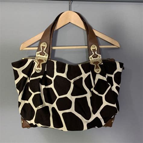 michael kors cow print purse.